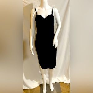 Gorgeous classic, shapely lined black dress, like new! Size 8